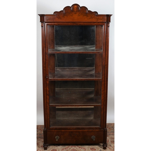 82 - A MAHOGANY CHINA DISPLAY CABINET the rectangular arched pediment above a glazed door containing shel... 