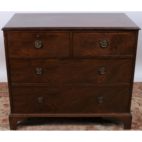 93 - A 19TH CENTURY MAHOGANY CHEST of rectangular outline the shaped top above two short and two long gra... 