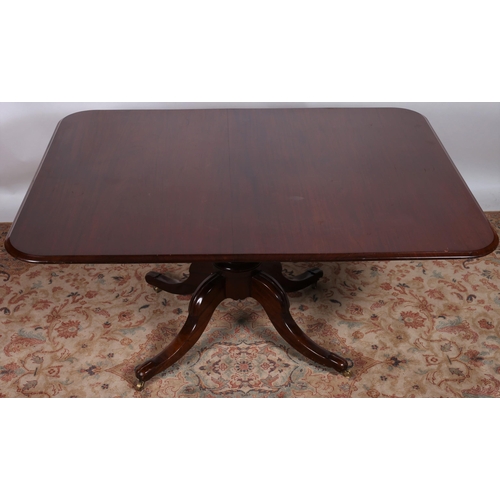 6 - A WILLIAM IV MAHOGANY POD TABLE of rectangular outline the shaped top with rounded corners above a b... 