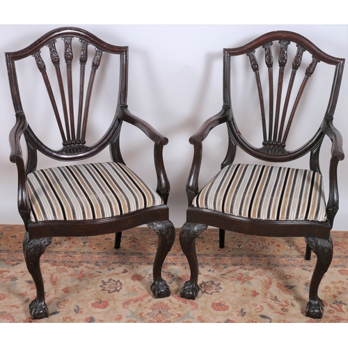 24 - A PAIR OF HEPPLEWHITE DESIGN MAHOGANY CARVERS each with a shaped top rail and carved vertical splats... 