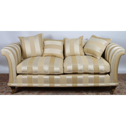 39 - A DAVID GUNDY, AMALFI DESIGN SETTEE with scroll over back and arms and loose cushions on square moul... 