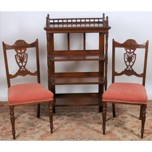 42 - AN EDWARDIAN MAHOGANY FOUR TIER WHATNOT of rectangular outline with pierced gallery above four open ... 