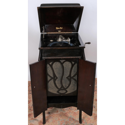 44 - A VINTAGE OAK GRAMOPHONE inscribed 'Edison Bell' the hinged lid containing a turntable above a pair ... 