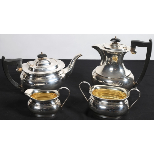 467 - A SILVER AND GILT LINED FOUR PIECE TEA AND COFFEE SERVICE comprising coffee pot, teapot, sugar bowl ... 