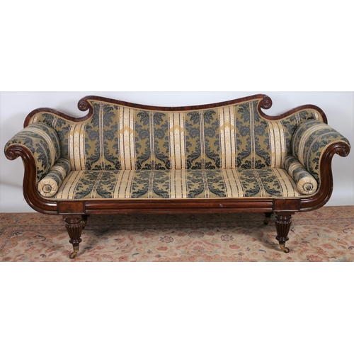19 - A 19TH CENTURY MAHOGANY DOUBLE SCROLL END SETTEE the shaped top rail above an upholstered panel and ... 