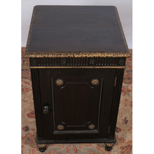 54 - A CONTINENTAL MAHOGANY AND PARCEL GILT PEDESTAL of rectangular outline the shaped top with gadrooned... 