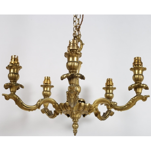 617 - A 19TH CENTURY GILT BRASS FIVE BRANCH CHANDELIER the foliate and reeded central column issuing five ... 