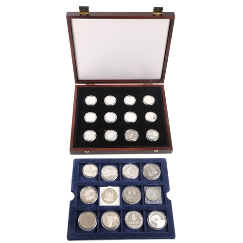 276 - A collection of 24 silver commemorative proof coins, mainly sporting events, especially Football and... 