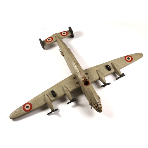 304 - Model bomber, scratch-built, painted wooden model of a WWII Consolidated B-24 Liberator in French co... 