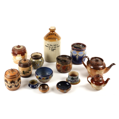 308 - A collection of Royal Doulton stoneware tobacco jars and two teapots, also a Pickup & Co. Bristol st... 