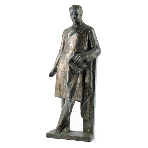 45 - Roger Casement bronzed metal figure of the revolutionary leader wearing frock coat and holding a doc... 