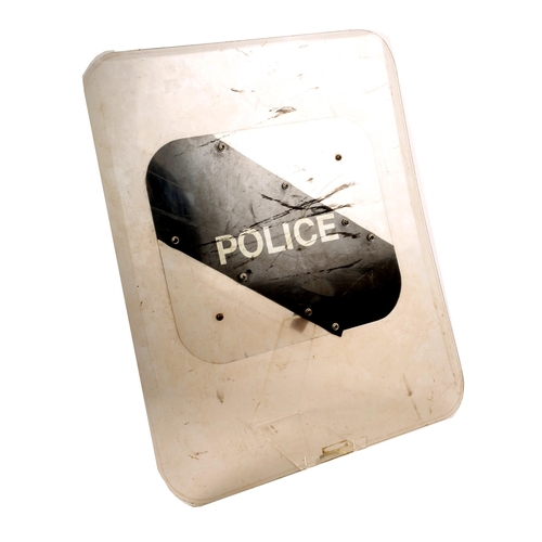 81 - Royal Irish Constabulary, RUC riot shield. A Perspex shield emblazoned 'POLICE' with padded forearm ... 