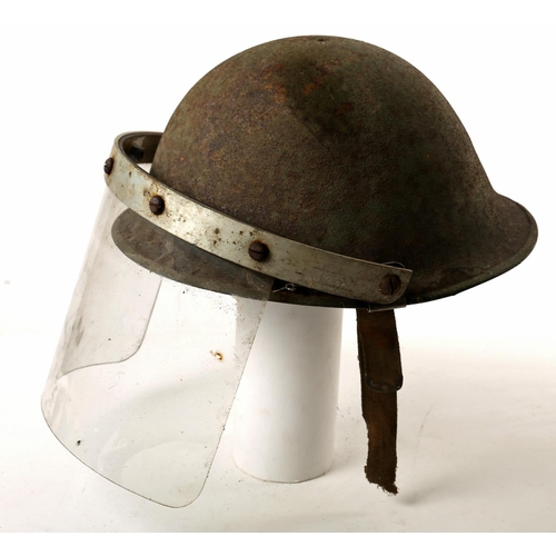 95 - Oglaigh na hÉireann, Irish Army, riot helmet. A Mk IV 'turtle' combat steel helmet, converted for pu... 