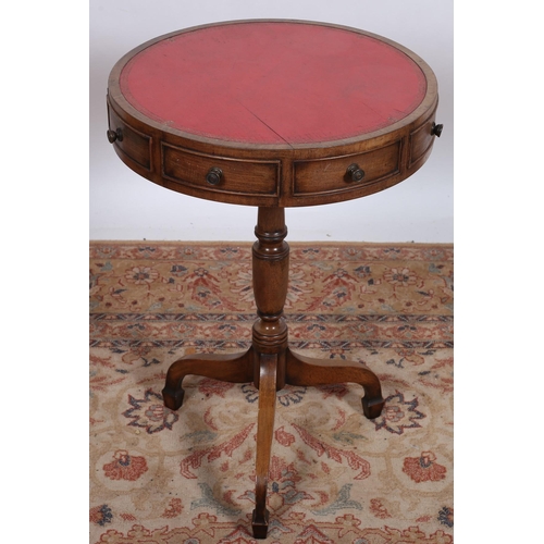 63 - A GEORGIAN DESIGN MAHOGANY DRUM TABLE the circular moulded top with tooled leather inset above four ... 