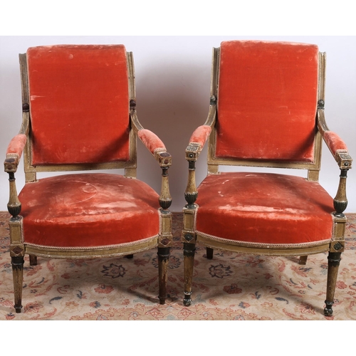 85 - A PAIR OF 19TH CENTURY GILTWOOD AND UPHOLSTERED ARMCHAIRS each with a scroll over back and shaped se... 