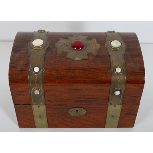 117 - A 19TH CENTURY WALNUT AND BRASS BOUND CASKET of rectangular domed form inset with semi precious ston... 