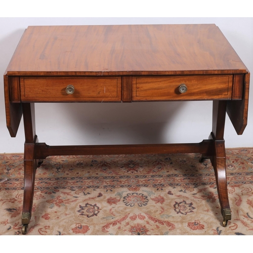 226 - A GEORGIAN DESIGN MAHOGANY SOFA TABLE the rectangular hinged top with two frieze drawers with opposi... 