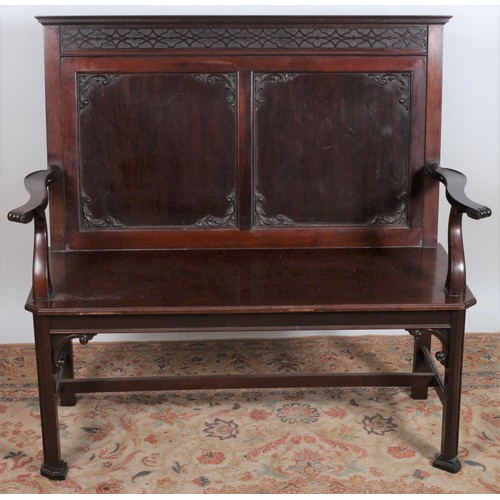 229 - A CHINESE CHIPPENDALE DESIGN MAHOGANY BENCH the blind fret top rail above a panelled back with appli... 