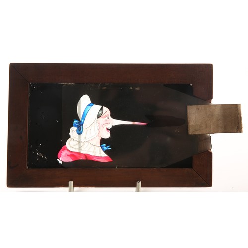 13 - A collection of hand painted and transfer printed magic lantern slides, with nursery and humourous s... 