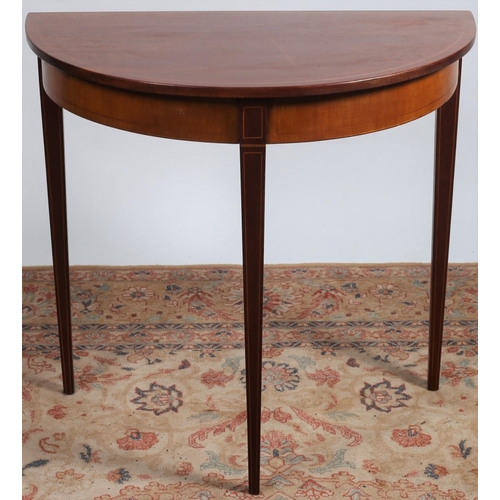 358 - A SHERATON DESIGN MAHOGANY AND SATINWOOD INLAID SIDE TABLE of demi lune outline the shaped top raise... 