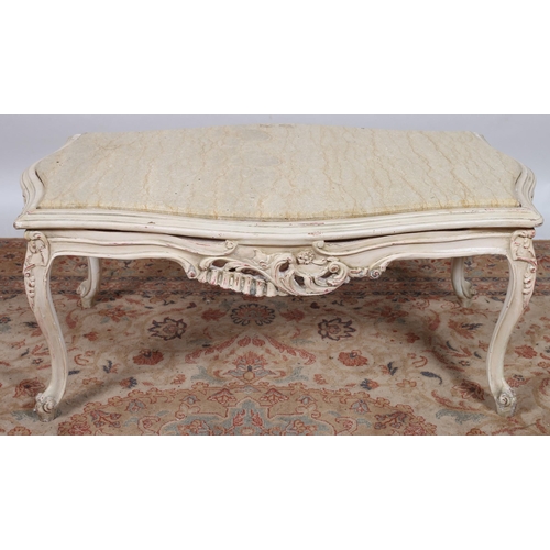 359 - A CONTINENTAL WHITE PAINTED COFFEE TABLE of serpentine outline the shaped top with veined marble ins... 