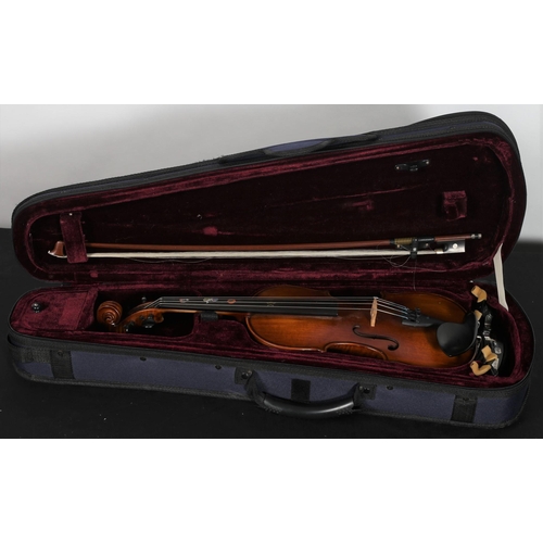 384 - A THREE QUARTER SIZE VIOLIN in case with bow and accessories 
33cm (l)