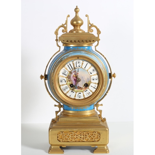 385 - A 19TH CENTURY FRENCH GILT BRASS AND PORCELAIN CLOCK the circular case with painted dial and urn fin... 