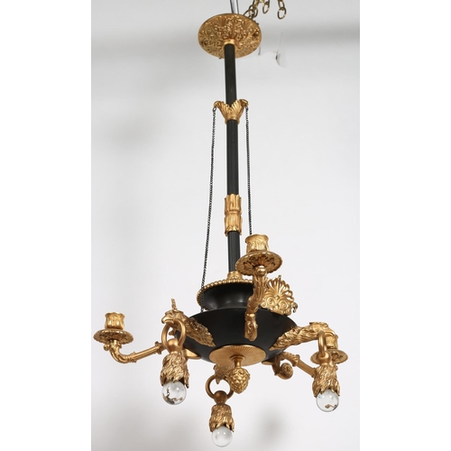 413 - A REGENCY DESIGN GILT BRASS THREE BRANCH CANDLE CENTRE LIGHT the reeded column above a circular dish... 