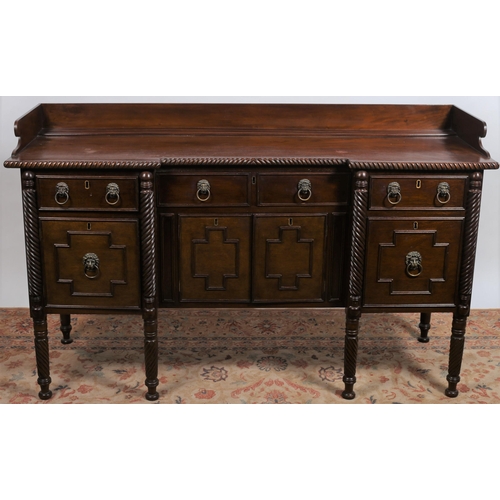 446 - A 19TH CENTURY MAHOGANY SIDEBOARD of inverted breakfront outline the shaped top with moulded three q... 