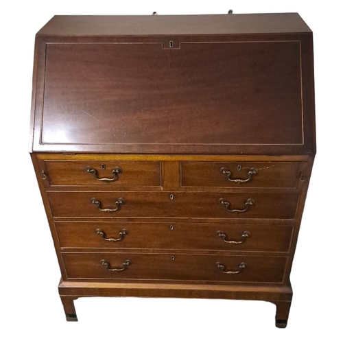 454 - A GOOD MAHOGANY BUREAU by James Hicks Dublin the hinged writing slope containing pigeon holes and dr... 