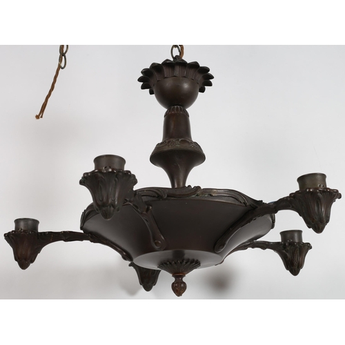 790 - A VINTAGE BRONZED SIX BRANCH CHANDELIER the baluster column above a circular dish issuing six leaf c... 