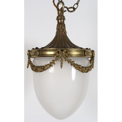 779 - A BRASS OPALINE GLASS CENTRE LIGHT of dome form the circlet hung with ribbon tied floral festoons
65... 