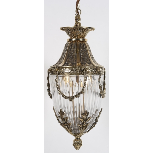 796 - A VINTAGE BRASS CENTRE LIGHT of ovoid tapering form hung with floral garlands and foliate cast mount... 