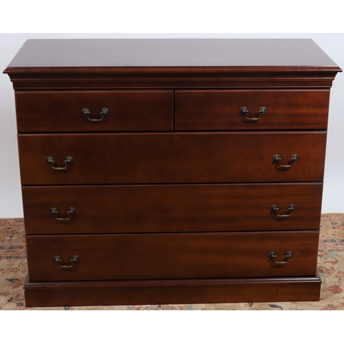 739 - A MAHOGANY CHEST of rectangular outline the shaped top above two short and three long drawers with b... 