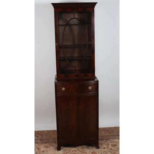 749 - A GEORGIAN DESIGN MAHOGANY DISPLAY CABINET of rectangular bowed outline the dentil moulded cornice a... 