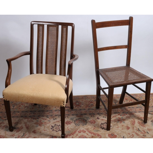 712 - A VINTAGE MAHOGANY BERGERE AND UPHOLSTERED ELBOW CHAIR the caned back above an upholstered seat on s... 