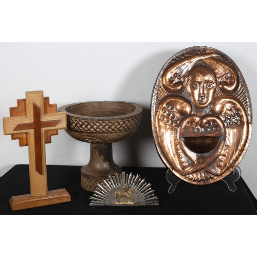 669 - A CARVED WOOD CHALICE together with a copper embossed wall mounted water font inscribed 'In Memory o... 