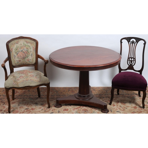 690 - A 19TH CENTURY MAHOGANY SNAP TOP BREAKFAST TABLE of circular outline the shaped top above a cylindri... 