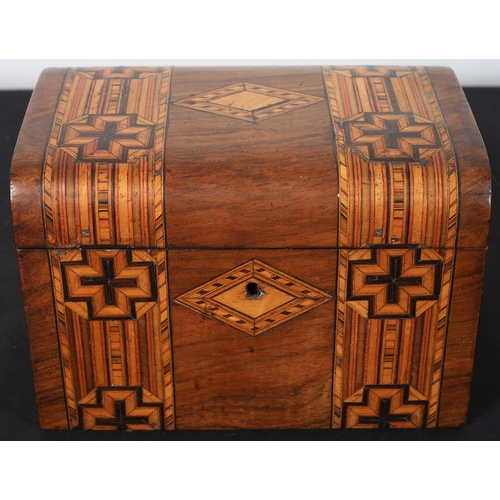 108 - A 19TH CENTURY ROSEWOOD AND BOX WOOD INLAID TEA CADDY the domed lid containing lidded compartments
1... 