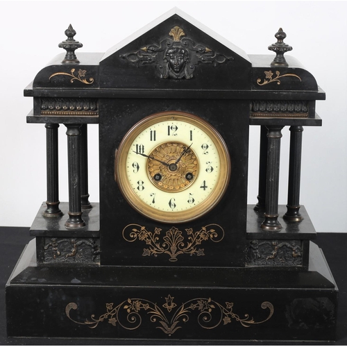 109 - A VINTAGE BLACK MARBLE AND GILT BRASS MANTLE CLOCK of architectural outline on a rectangular platfor... 