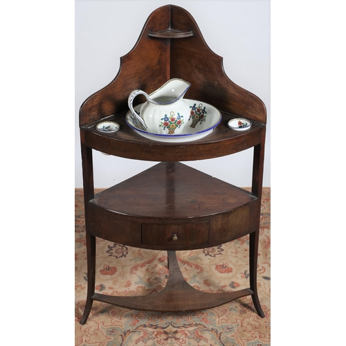 206 - A 19TH CENTURY MAHOGANY CORNER WASHSTAND the superstructure with moulded back above compartments fit... 