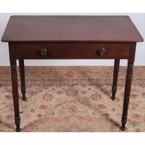 207 - A 19TH CENTURY MAHOGANY SIDE TABLE of rectangular outline the shaped top with frieze drawer on turne... 