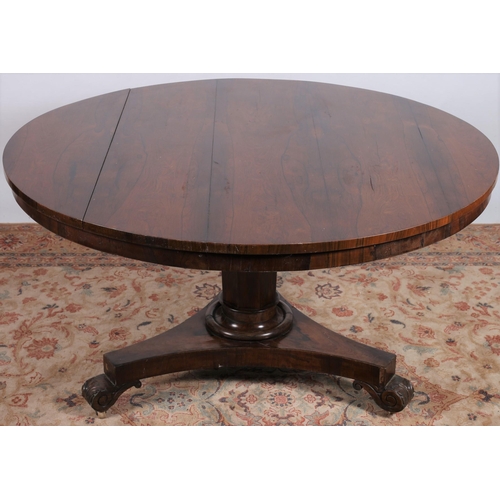 247 - A 19TH CENTURY ROSEWOOD POD TABLE the circular moulded top above a faceted column on platform base w... 