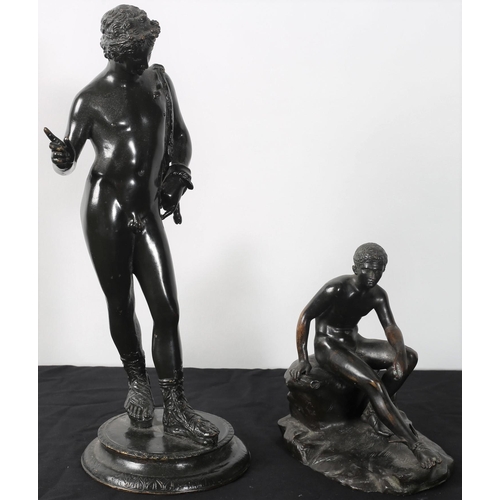 261 - A 19th CENTURY CAST BRONZE FIGURE modelled as a male shown seated on a rockwork base 20cm (h) togeth... 