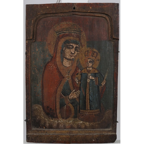 330 - A PINE AND POLYCHROME PANEL depicting Jesus and Mary oil 
31cm (h) x 21cm (w)