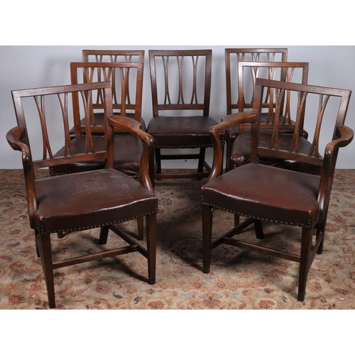 348 - A SET OF SEVEN GEORGIAN MAHOGANY FORK BACK DINING CHAIRS, including a pair of elbow chairs, each wit... 