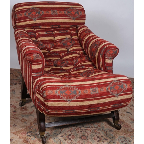 349 - A 19TH CENTURY MAHOGANY AND BUTTONED UPHOLSTERED ARMCHAIR the curved back with upholstered panel and... 