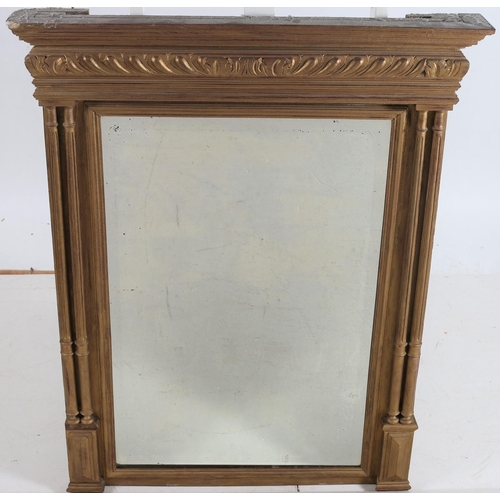 355 - A CONTINENTAL GILTWOOD MIRROR the rectangular bevelled glass plate within a moulded frame with flute... 