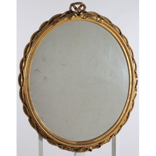 356 - A PAIR OF CONTINENTAL GILTWOOD AND GESSO MIRRORS each with an oval plate within a ropework frame wit... 