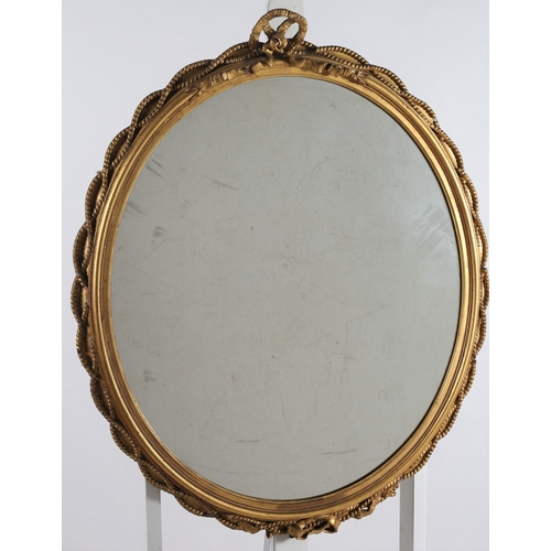 356 - A PAIR OF CONTINENTAL GILTWOOD AND GESSO MIRRORS each with an oval plate within a ropework frame wit... 